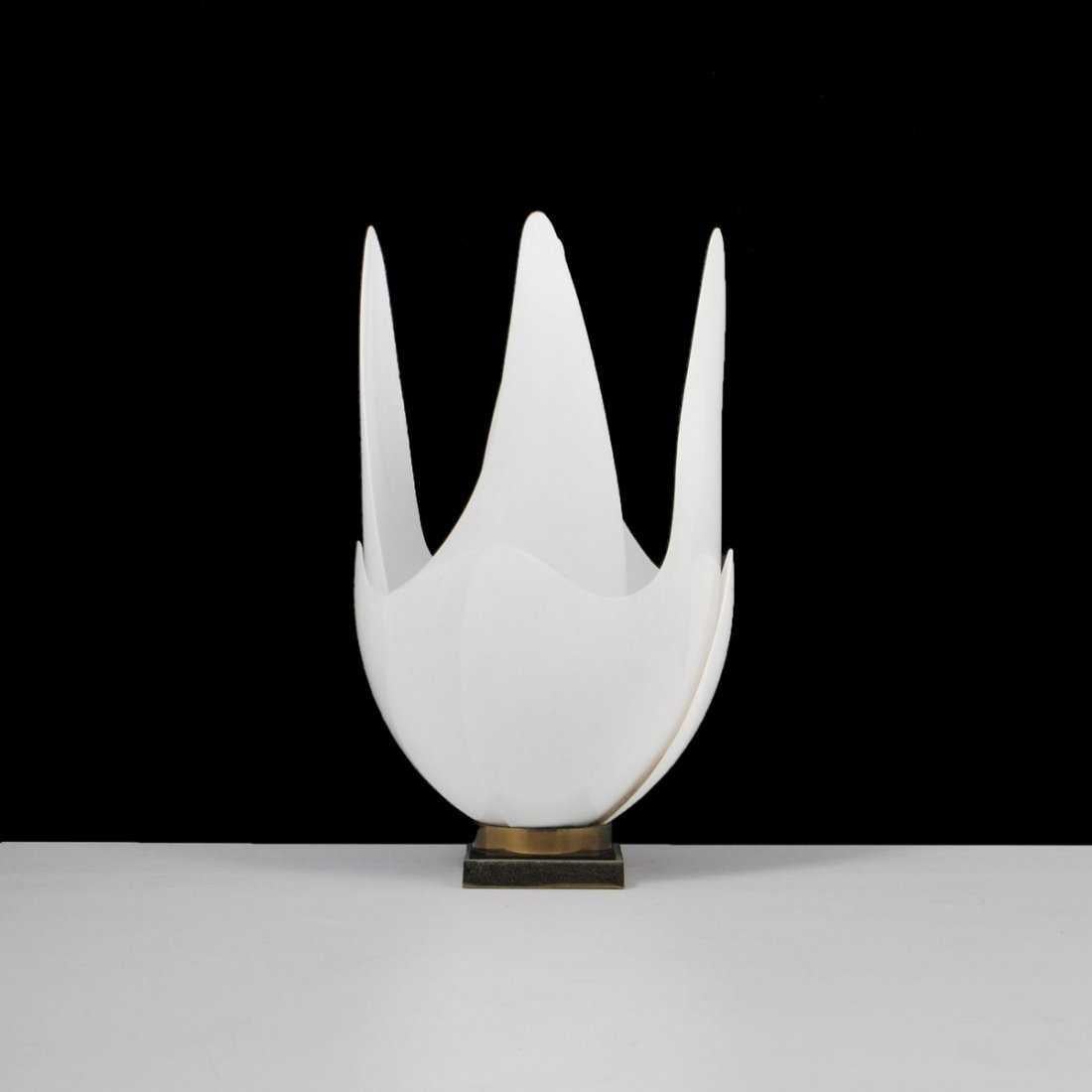 Roger Rougier Rougier was a Canadian company that did many variations of these fine acrylic resin lamps. Made of acrylic resin petals that fit into brass and black Lucite bases. The light illuminates beautifully through the white petals to create a