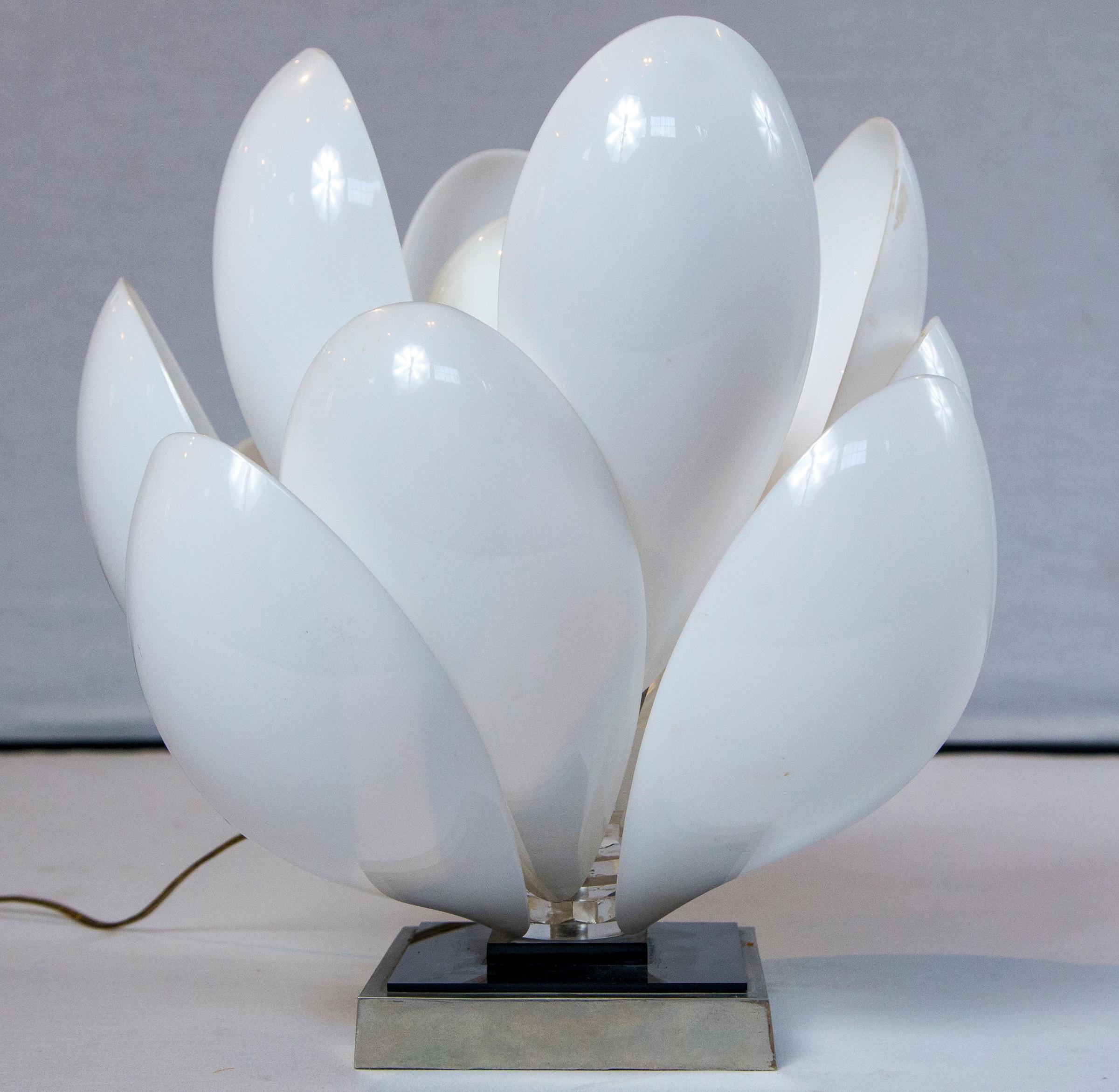 Roger Rougier Lucite lotus table lamp. A multiple Lucite leaf lotus flower with a center light bulb socket form this table lamp.