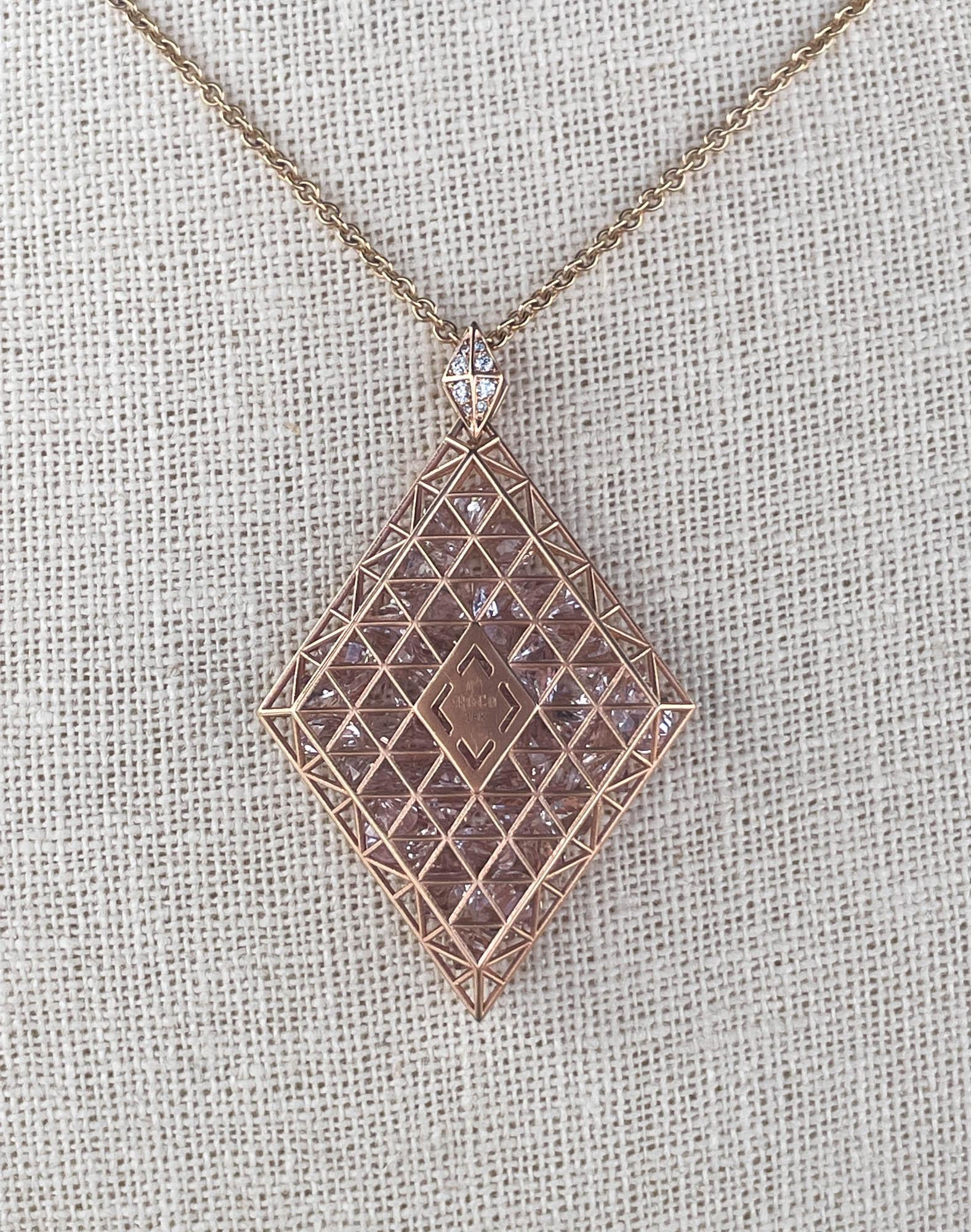 Roule & Co 18k Rose Gold Morganite Pendant Necklace with 23.26ctw Morganites.
Rhombus shaped pendant measures to approx. 50x35mm and 56mm long with diamond loop.
The Cable link chain is 30 inches in length and secured with a lobster clasp.
The total