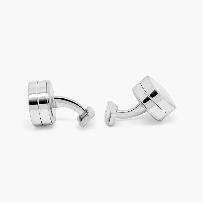 Roulette Cufflinks in Stainless Steel

Our playful series takes on the casino theme with our Roulette. Made from rhodium-plated stainless steel with a transparent glass case. Hold the cufflinks at 180 degrees and spin to release a ball which reveals