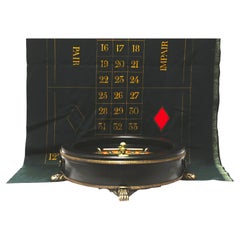Roulette wheel with original roulette felt scoring cloth, French circa 1890