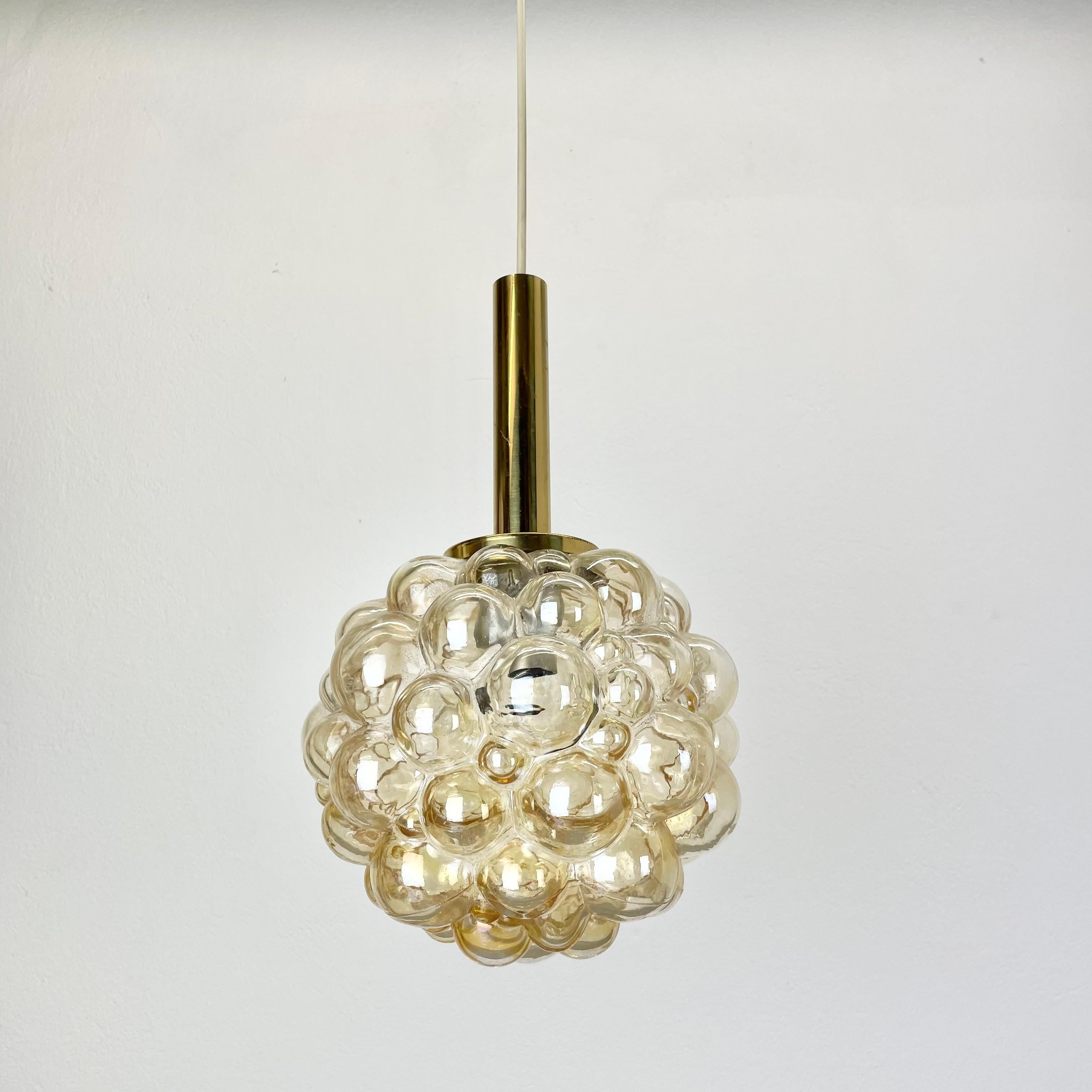 Article:

hanging light



Producer: 

Glashütte Limburg, Germany


Design:

Helena Tynell


Origin: 

Germany


Age: 

1970s



Description: 

This fantastic glass hanging light was designed by Helena Tynell and produced in 1970s in Germany by