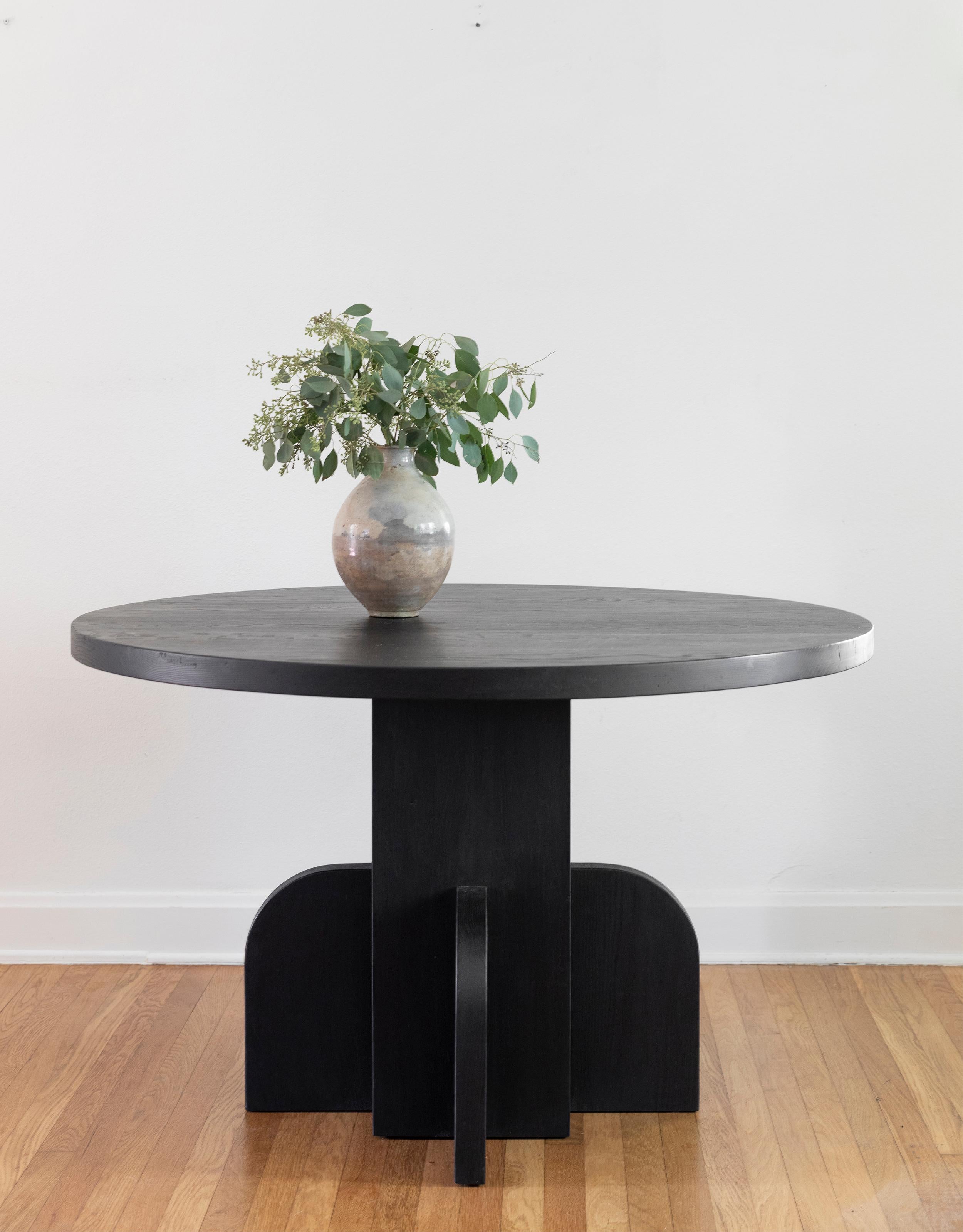 The Ratio dining table was designed by Scott Martin of the Austin-based Seer Studio. The designs are based on hand drawings by Scott Martin, loosely inspired by the feeling of 1940s French and 1970s Italian furniture design styles. Scott’s bold
