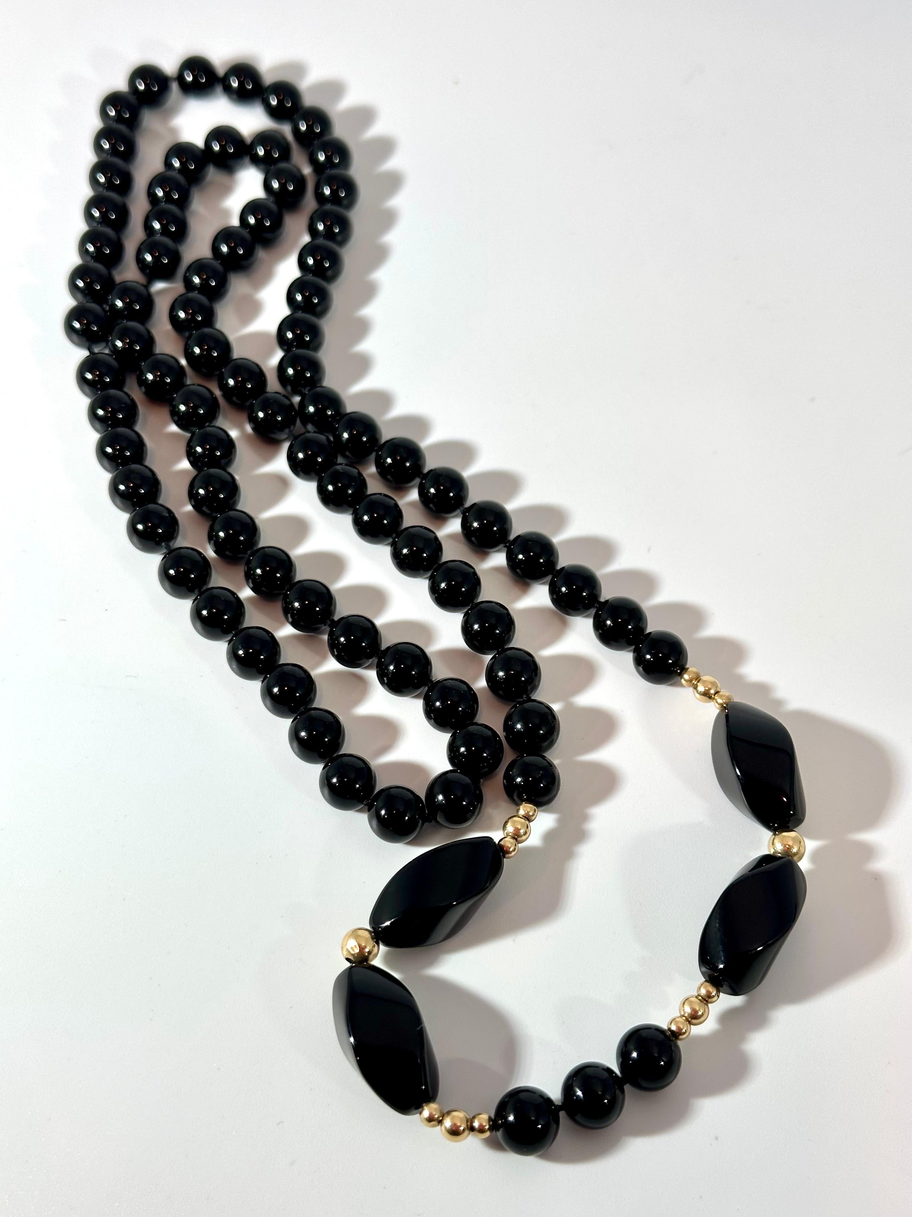 Round 8 MM Bead Black Onyx & 14 Karat Gold Bead Necklace 32 Inch Long In Excellent Condition For Sale In New York, NY