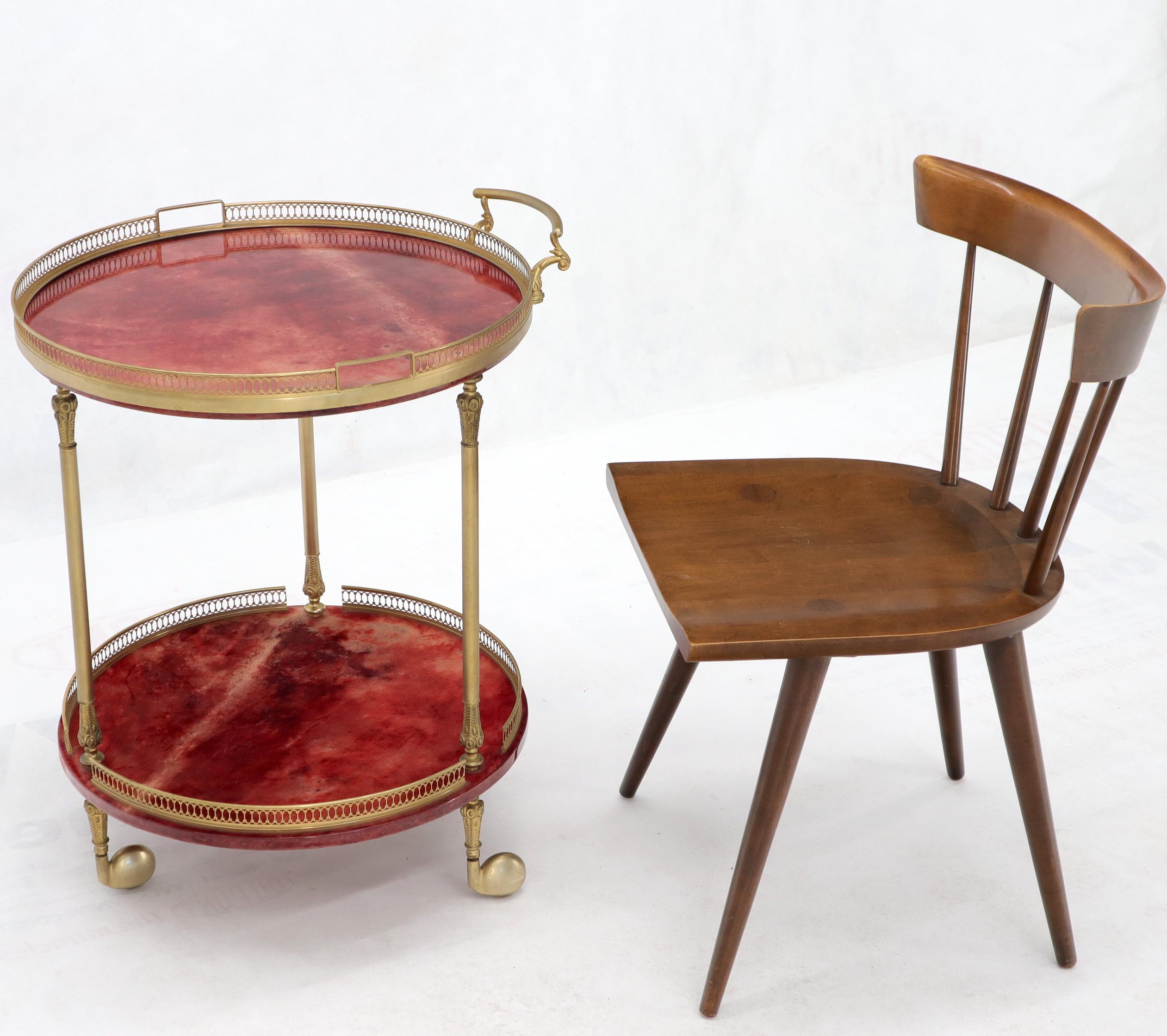 Mid-Century Modern burgundy lacquered parchment round Aldo Tura serving tea cart bar. Made in Italy.