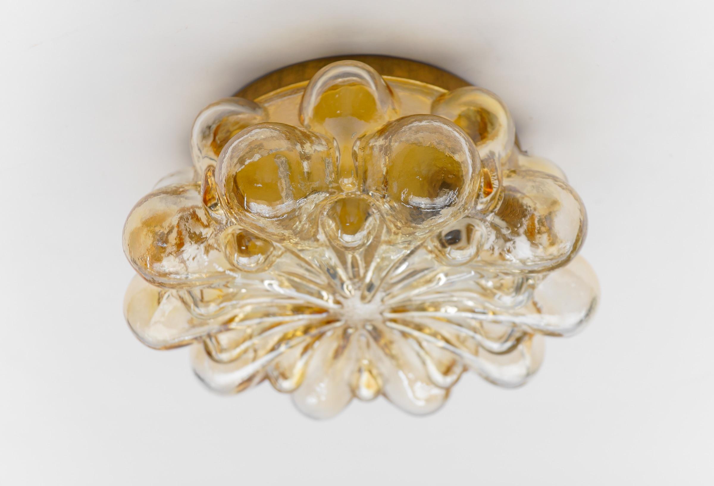 Round Amber Bubble Glass Wall Lamp / Flush Mount, 1960s Limburg

The fixture need 1 x E27 standard bulb with 60W max.

Light bulbs are not included. 

It is possible to install this fixture in all countries (US, Australia, Asia, UK, Europe,..)

 