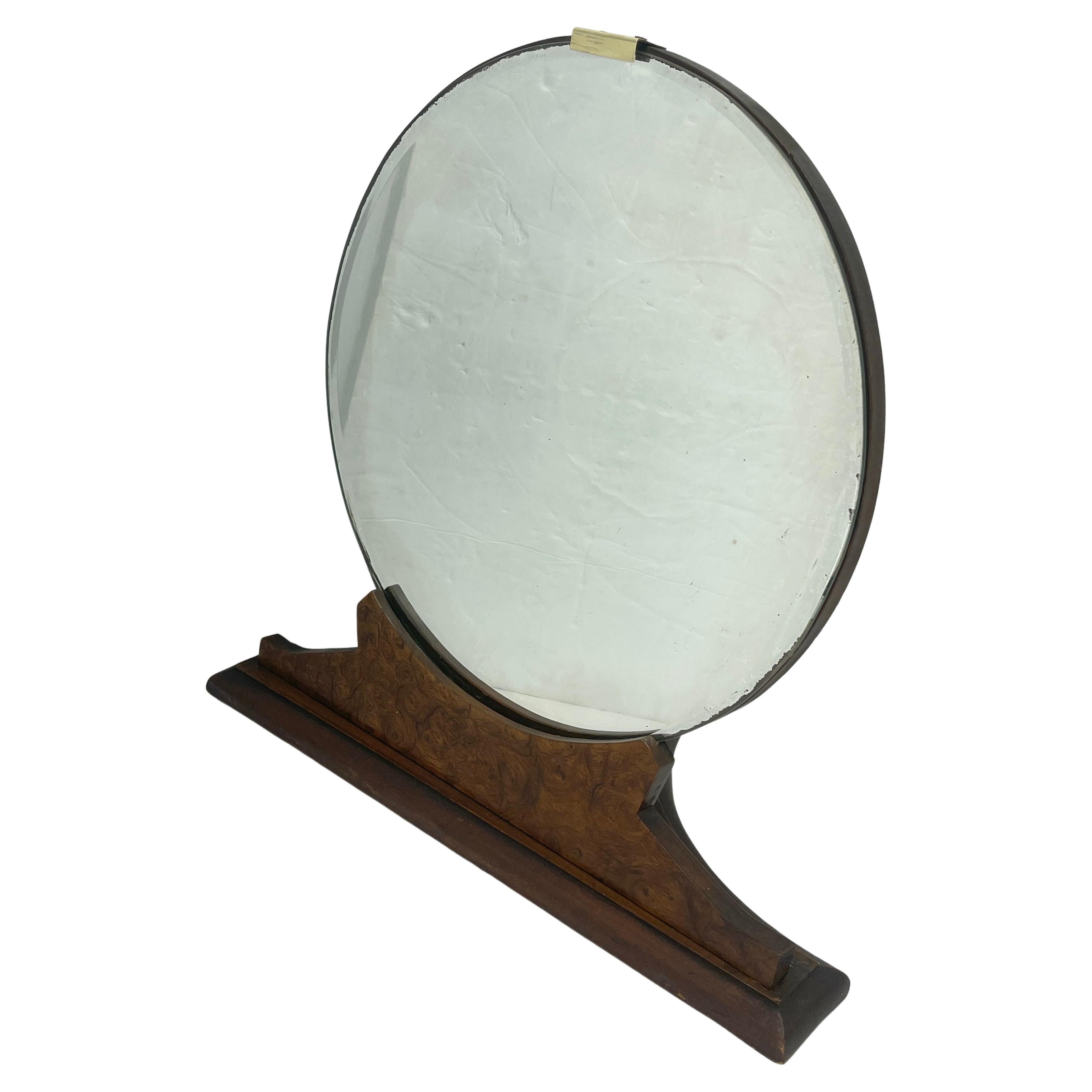 Amerikanischer Burlwood Eitelkeitstischspiegel mit rundem Spiegelglas und Messingbeschlägen, CIRCA 1930er Jahre.