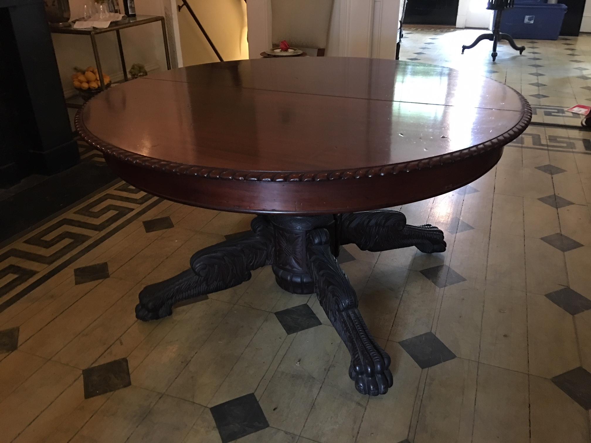 Round American empire pedestal dining table with extension leaf, 19th century. Leaf is 12.75