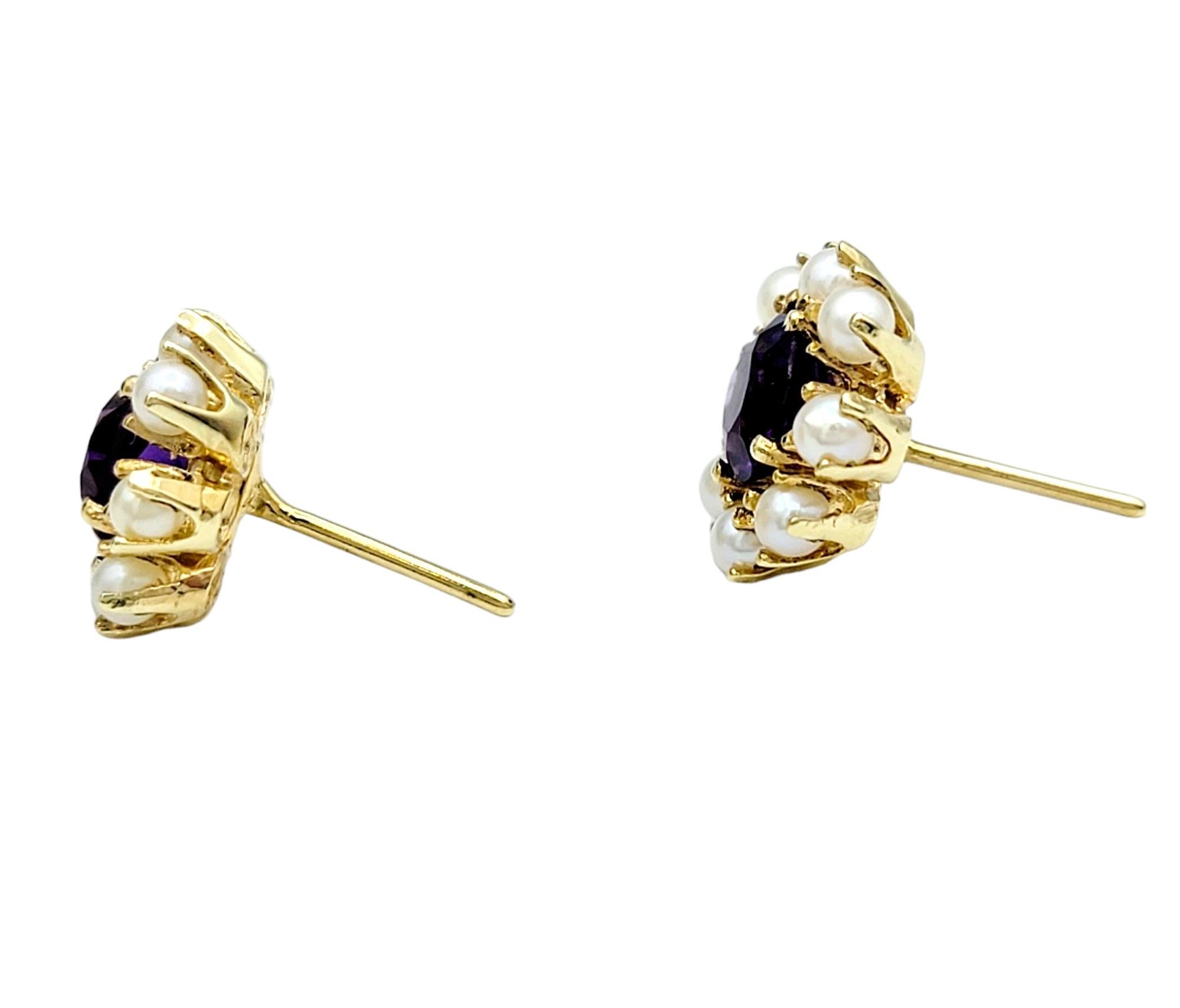 These gorgeous stud earrings, set in warm and radiant 14 karat yellow gold, exude a captivating charm. At the heart of each earring is a round amethyst, showcasing its vibrant purple hue and inherent allure. Surrounding the amethyst is a delicate
