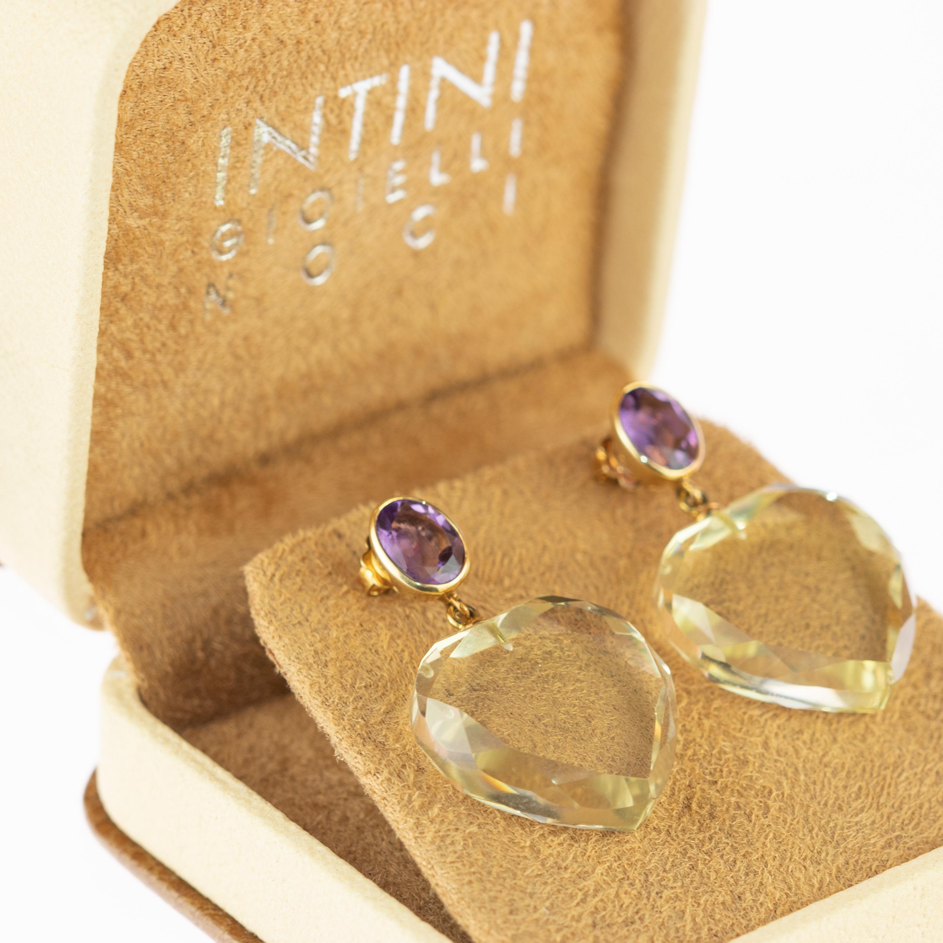 Take love with you everywhere! These breathtaking earrings have a sweet design and the most precious stones.  The amethyst activates spiritual awareness, opens intuition and enhances your senses to find love. The crystal rock encourages emotional
