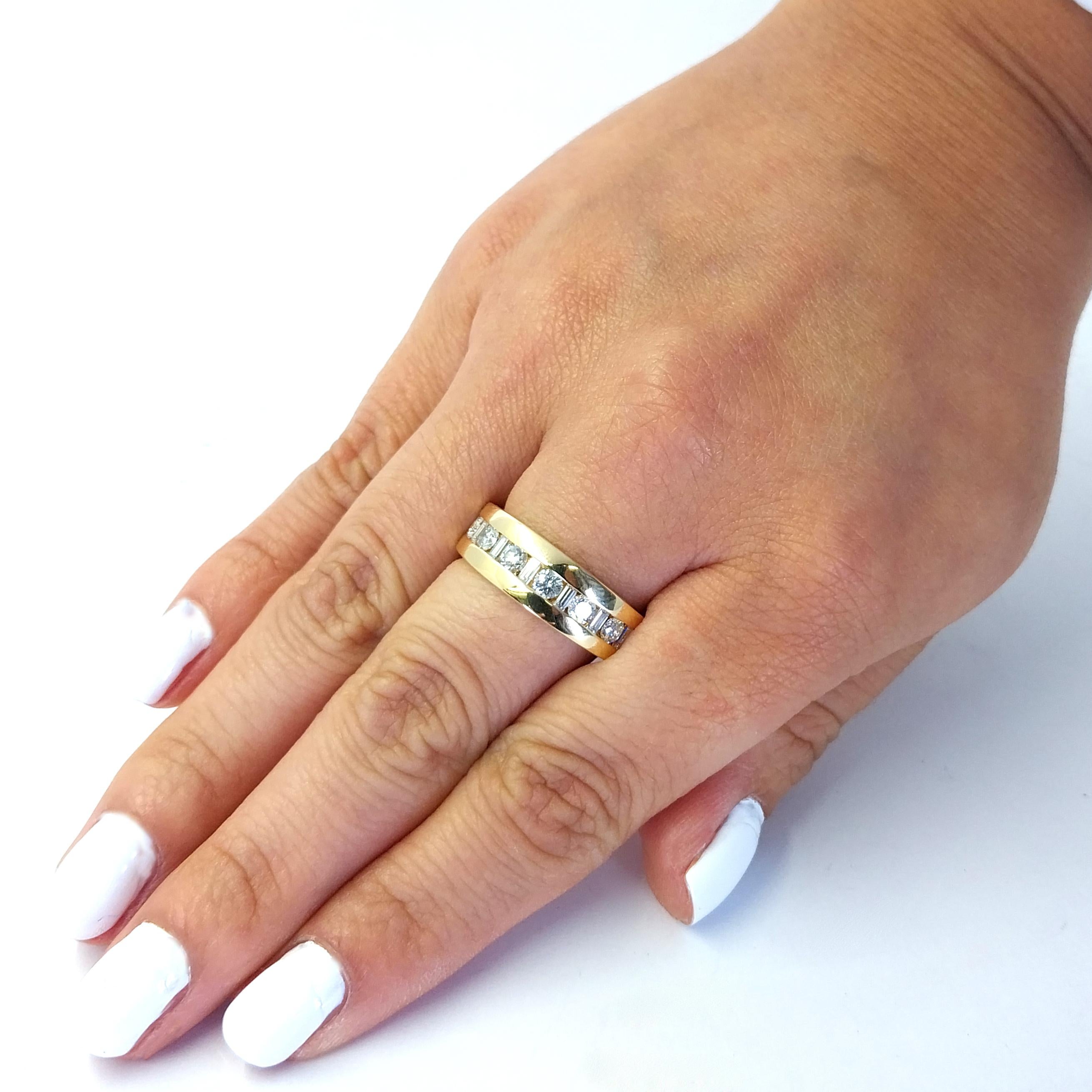 18 Karat Yellow Gold Channel Band Featuring 13 Alternating Round Brilliant and Baguette Cut Diamonds of SI Clarity and H Color Totaling Approximately 1.00 Carat. Finger Size 8. Purchase Includes One Sizing Service, Upon Request. Finished Weight is
