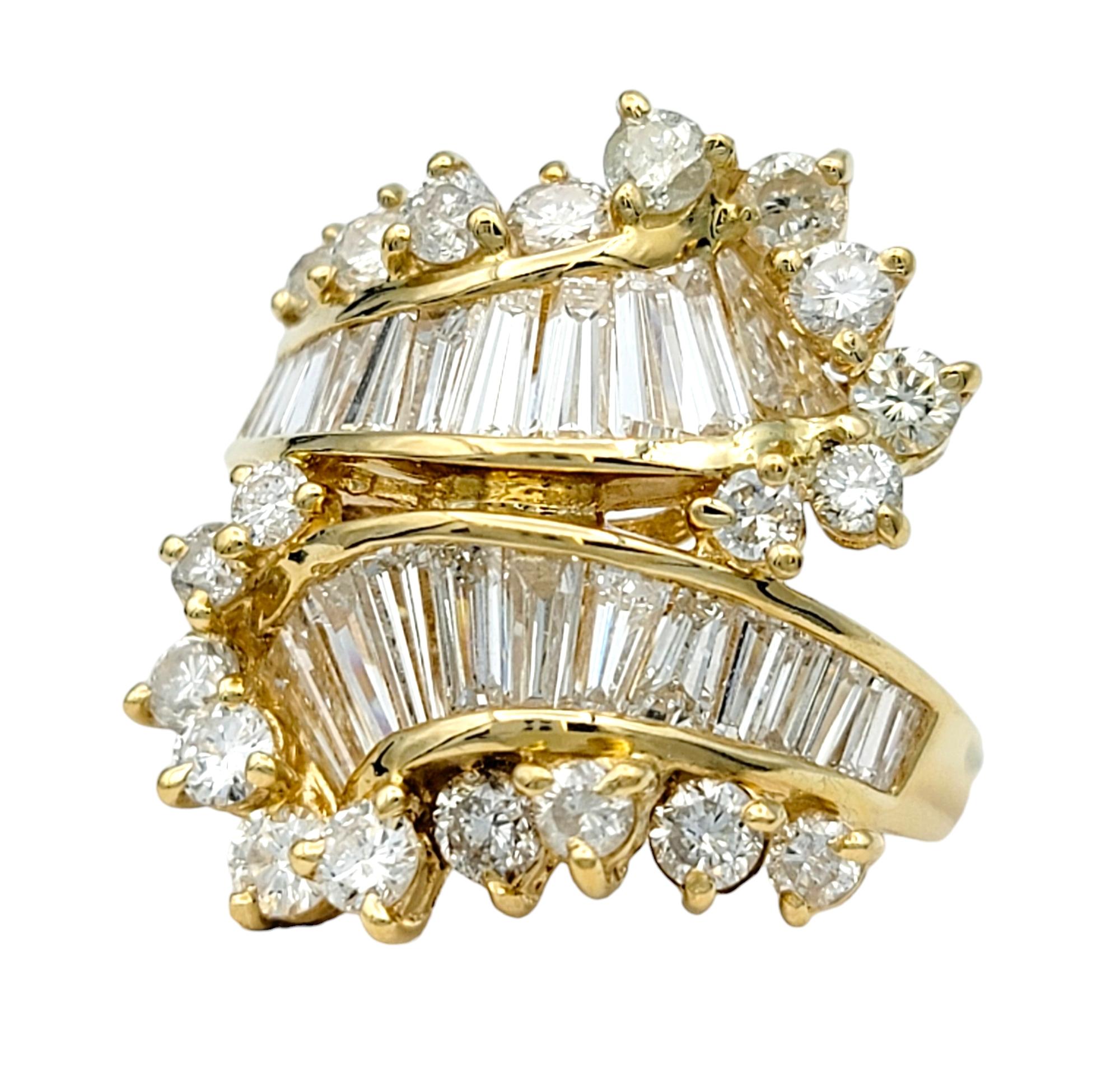 Contemporary Round and Baguette Diamond Bypass Style Cocktail Ring in 14 Karat Yellow Gold For Sale