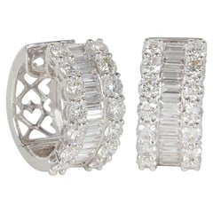 Boucles d'oreilles créoles Huggie en or avec diamants ronds et baguettes