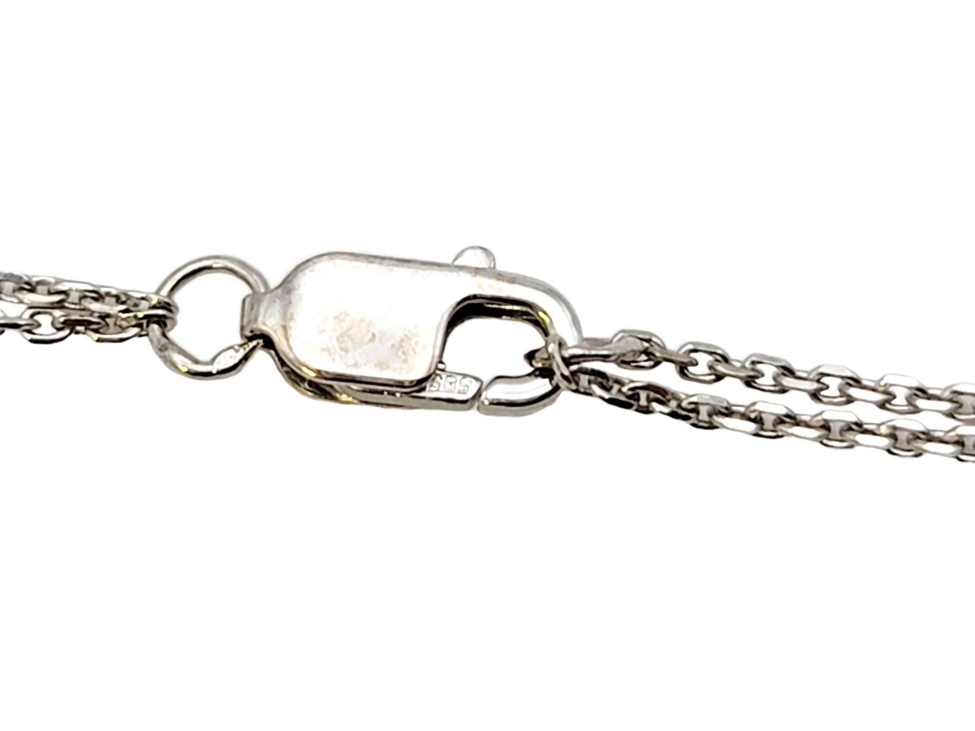 Collana a doppia catena con diamanti rotondi e baguette a forma di 