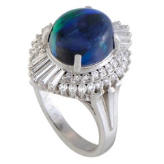 Round and Baguette Diamonds and Opal Oval Platinum Ring