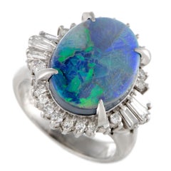Round and Baguette Diamonds and Opal Oval Platinum Ring