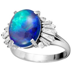 Round and Baguette Diamonds and Opal Platinum Oval Ring