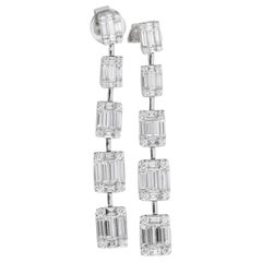 Round and Baguettes Dangling Drop Earrings in 18 Karat White Gold