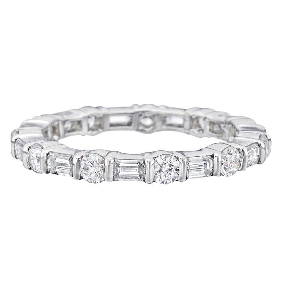 round and emerald cut eternity band