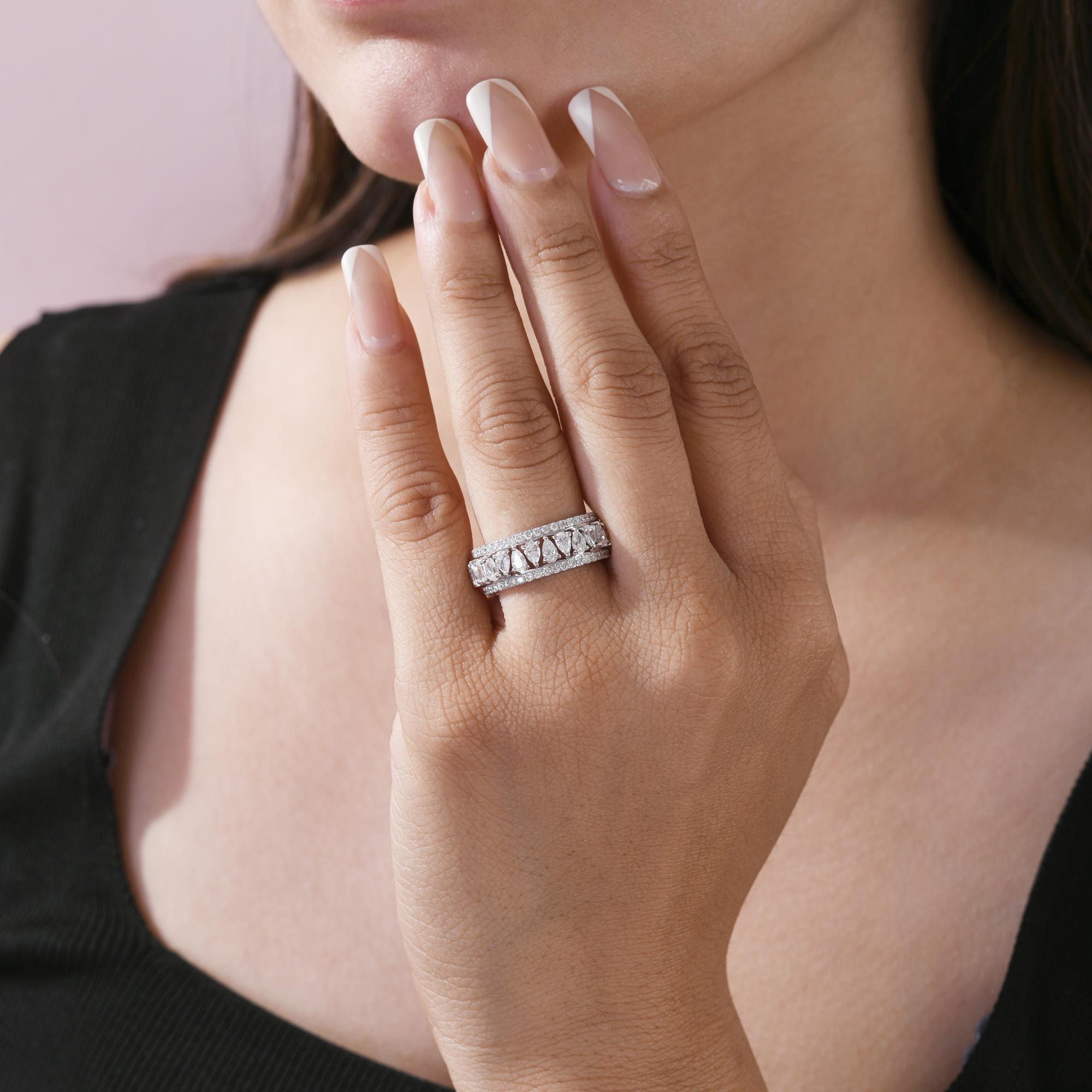 Round and Pear Diamond Stacking Eternity Band Ring Set 14K White Gold Jewelry 
This luxurious stack showcases a combination of round brilliant diamonds and pear diamonds arranged in a continuous eternity pattern. The center band highlights