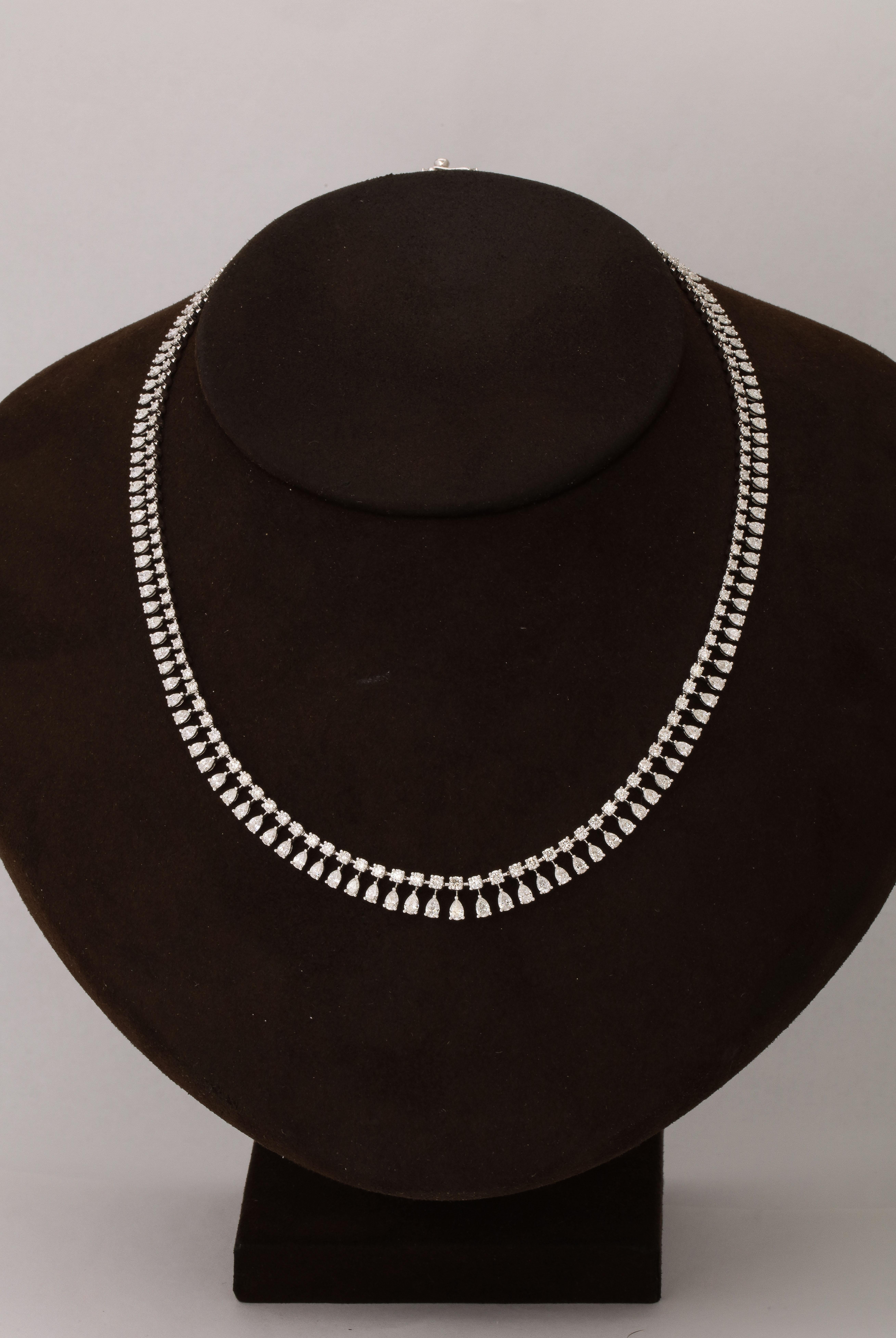 
A Fabulous choker layered or worn on its own! 

10.83 carats of white round and pear shape diamonds set in 18k white gold.

15.5 inch length. 
 
