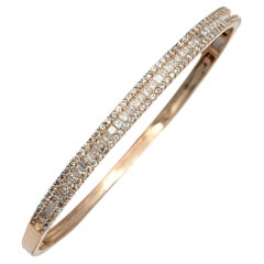 Scharnierarmband mit Diamanten im Rund- und Prinzessinnenschliff aus 14 Karat Roségold