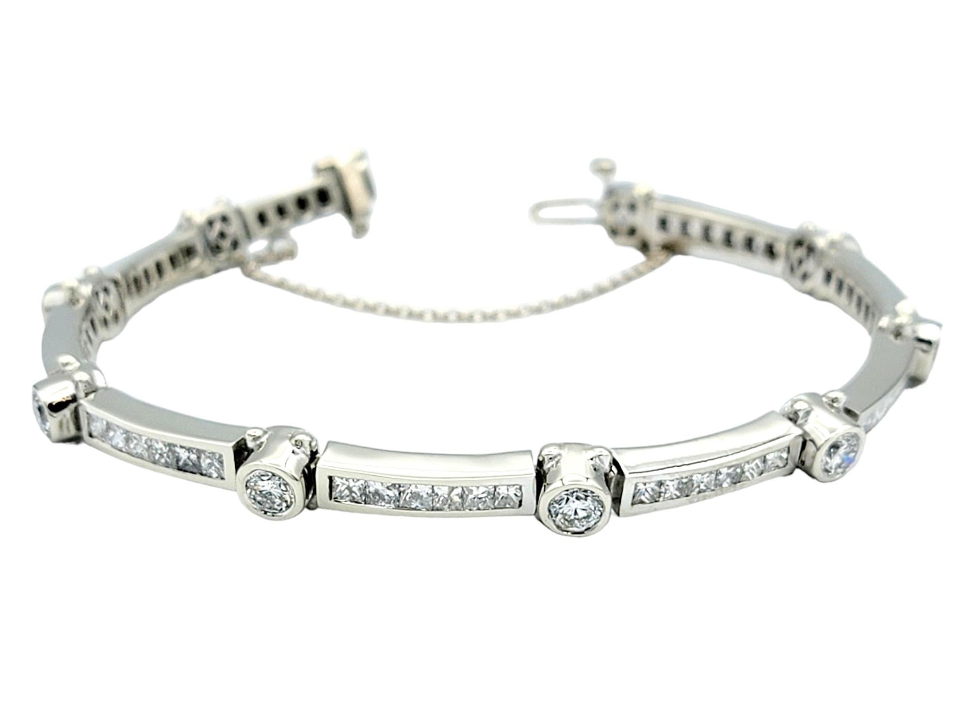 The inner circumference of this bracelet measures 6.75 inches and will comfortably fit a 6 - 6.5 inch wrist. 

This gorgeous link bracelet, set in elegant 14 karat white gold, is a captivating and luxurious piece with a unique design. The