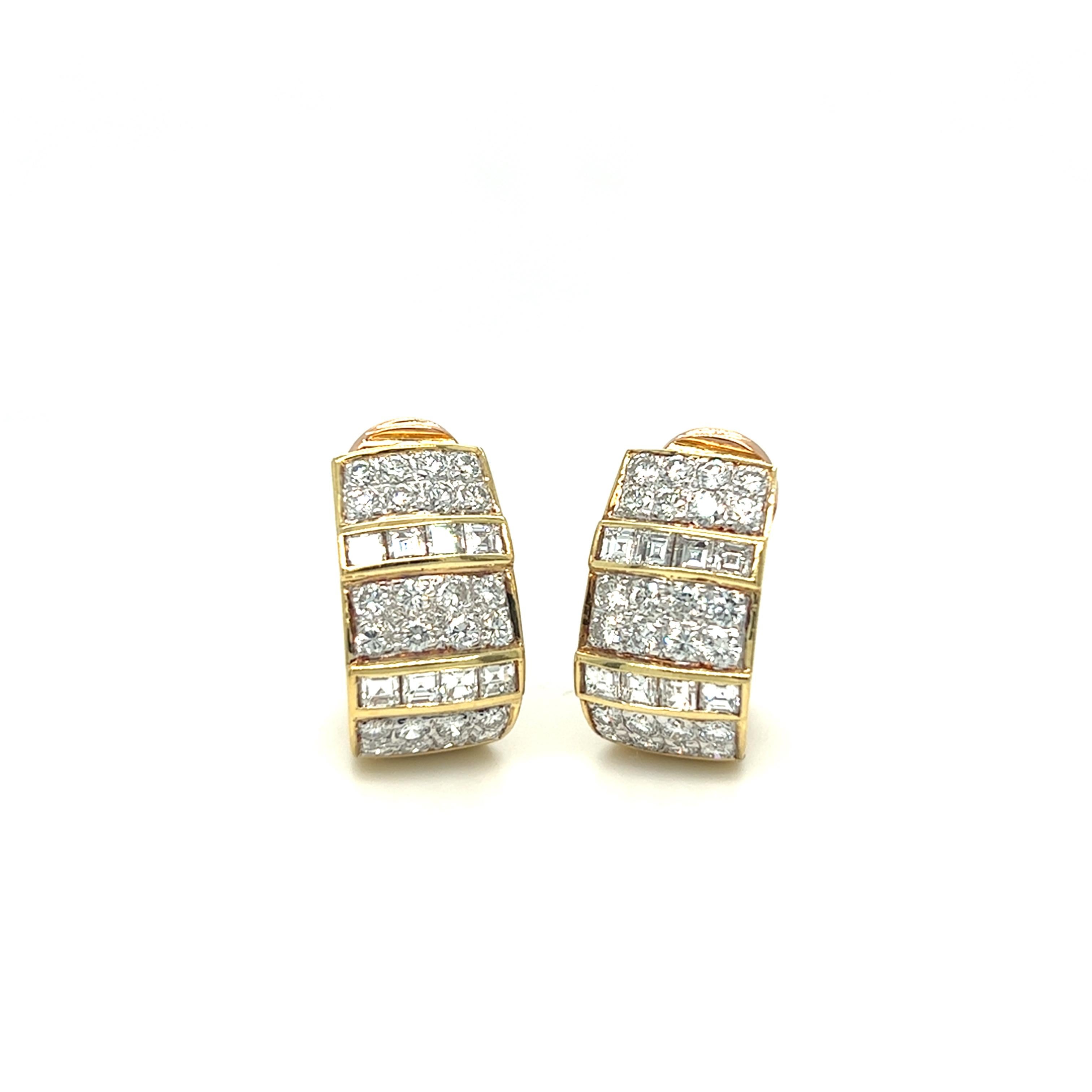 Dated 1960s, this beautiful pair of mixed cut diamond earrings features approximately 3.68 carats of round brilliant cut and square cut diamond. All are eye clean with F-G color and VS clarity. They are quite a statement piece, perfect for a night