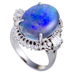 Round and Tapered Baguette Diamond Blue Opal Platinum Ring