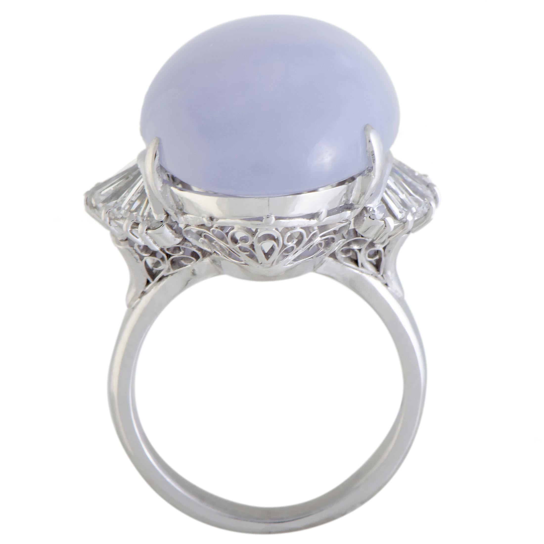 An appealing sense of ever-enticing femininity is present in this gorgeous jewelry piece, the result of combining the bright allure of platinum and diamonds with the sublime tone of lavender jade. The expertly cut jade weighs astounding 28.75