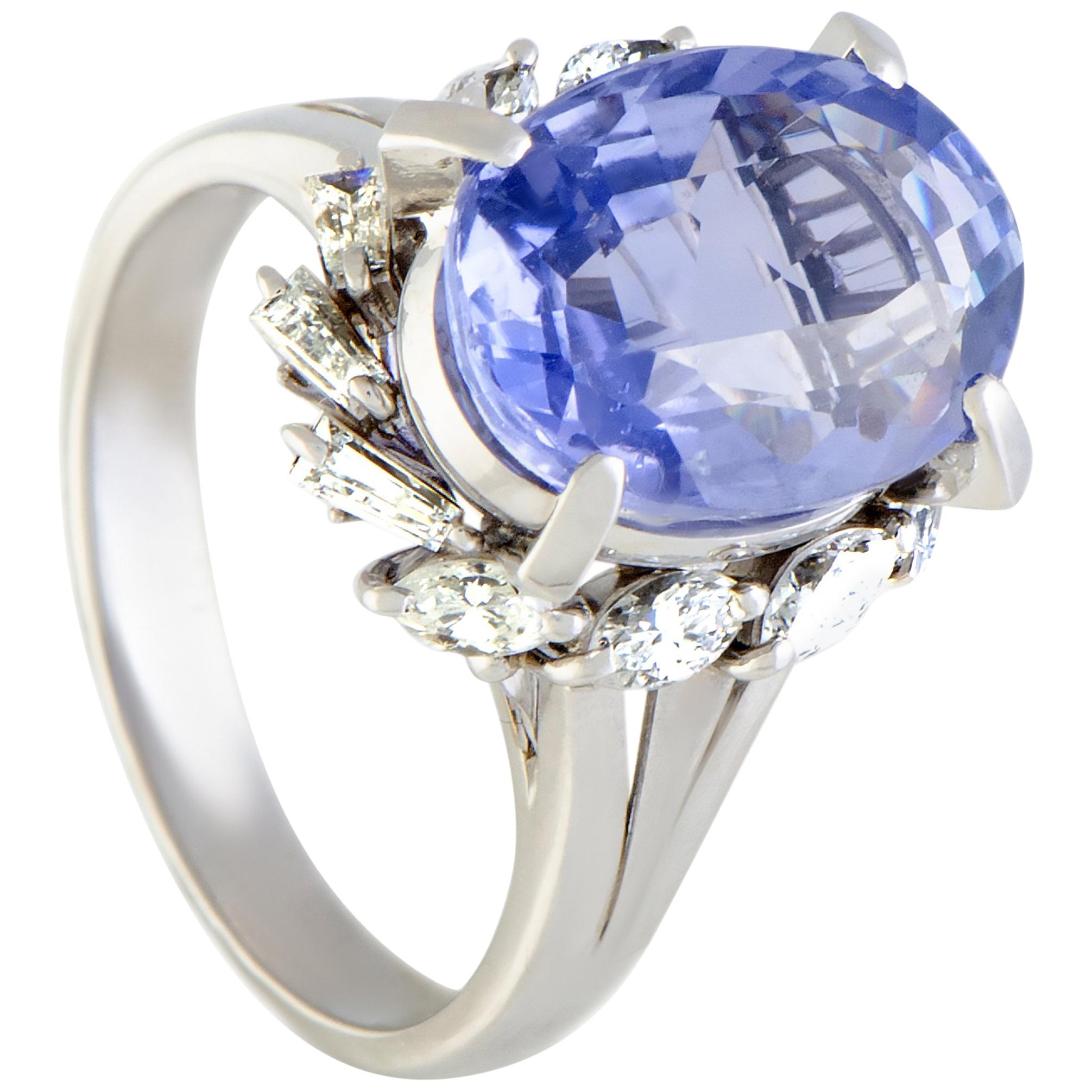 Round and Tapered Baguette Diamonds and Oval Sapphire Platinum Ring