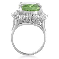 Round and Tapered Baguette Diamonds and Peridot Oval Platinum Ring