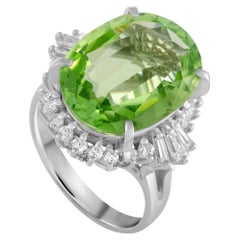 Round and Tapered Baguette Diamonds and Peridot Oval Platinum Ring