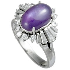 Round and Tapered Baguette Diamonds and Purple Sapphire Cabochon Platinum Ring