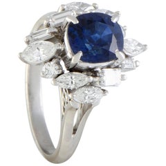 Round and Tapered Baguette Diamonds and Sapphire Platinum Ring