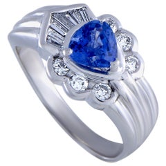 Round and Tapered Baguette Diamonds and Sapphire Platinum Ring