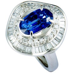 Round and Tapered Baguette Diamonds and Sapphire Platinum Ring
