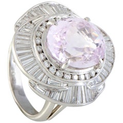 Vintage Round and Tapered Baguette Diamonds Oval Kunzite Platinum Ring