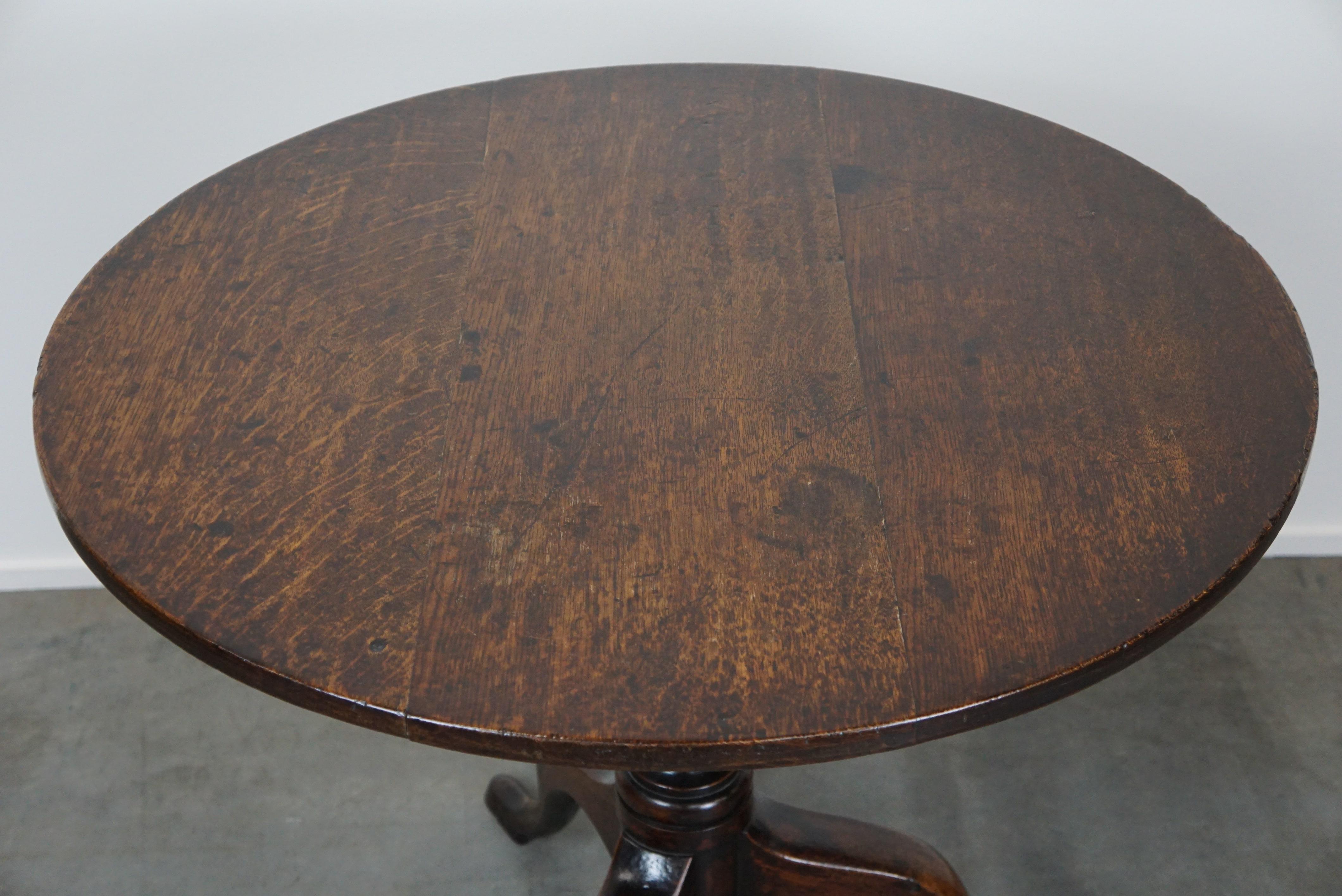 Wood Round antique English oak tilt-top table with wonderful colors For Sale