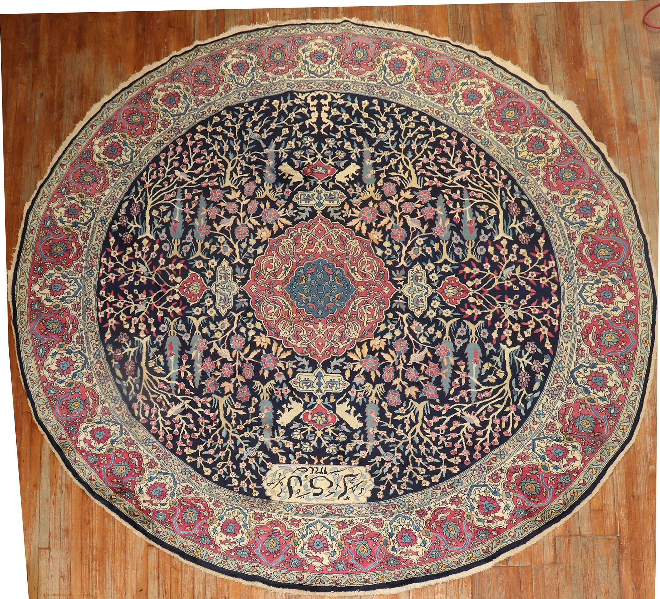 Rare Signed antique Indian round rug with a formal pictorial animal design.

Measures: 10'10'' x 10'11''.