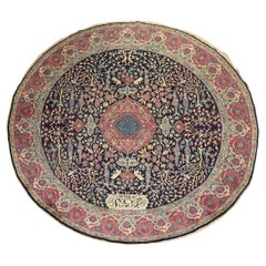 Tapis pictural indien ancien rond
