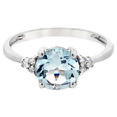 Anillo Aguamarina Redonda y Diamante Oro Blanco 14K