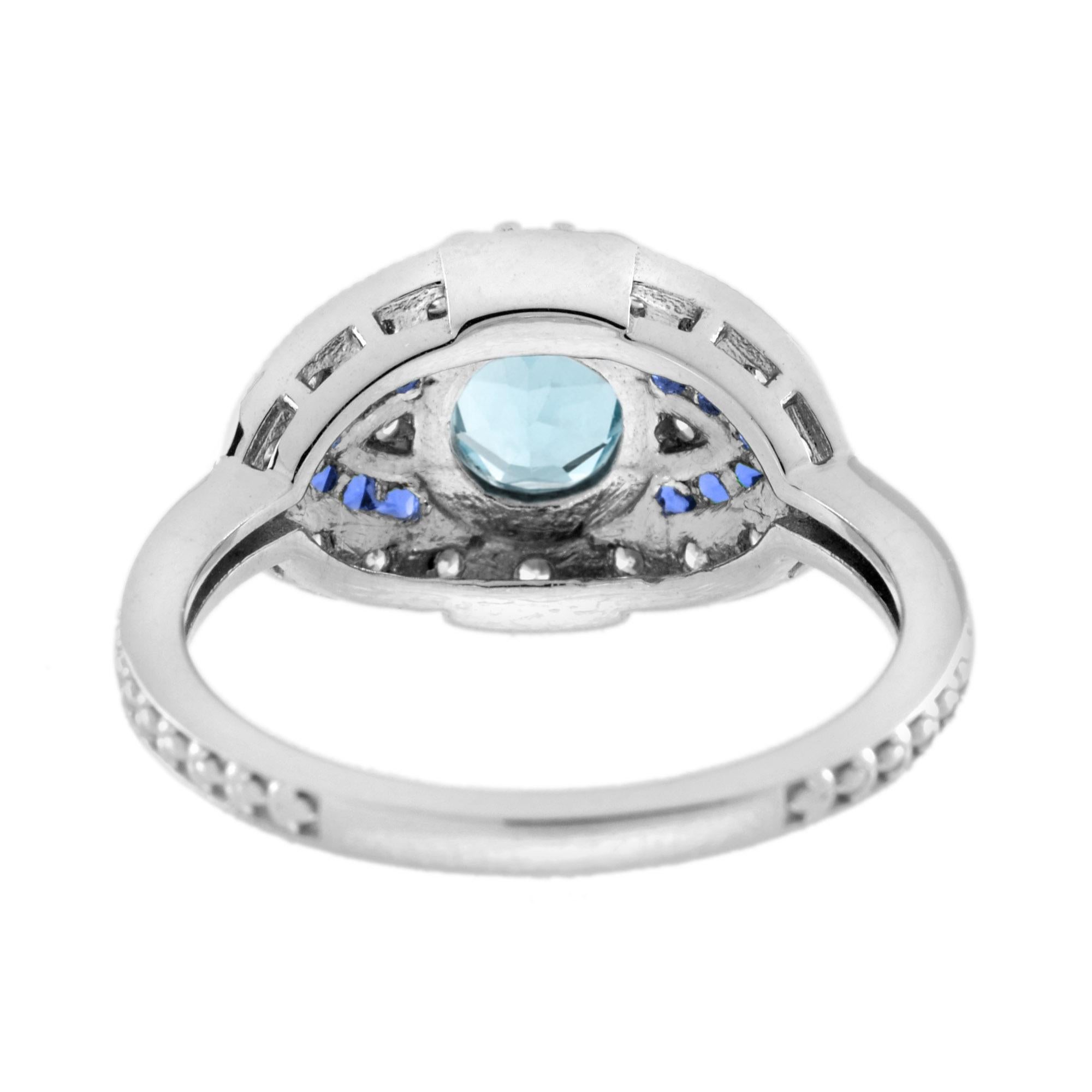 Anillo de compromiso de oro blanco de 14 quilates con aguamarina redonda y zafiro azul y diamantes Corte redondo en venta