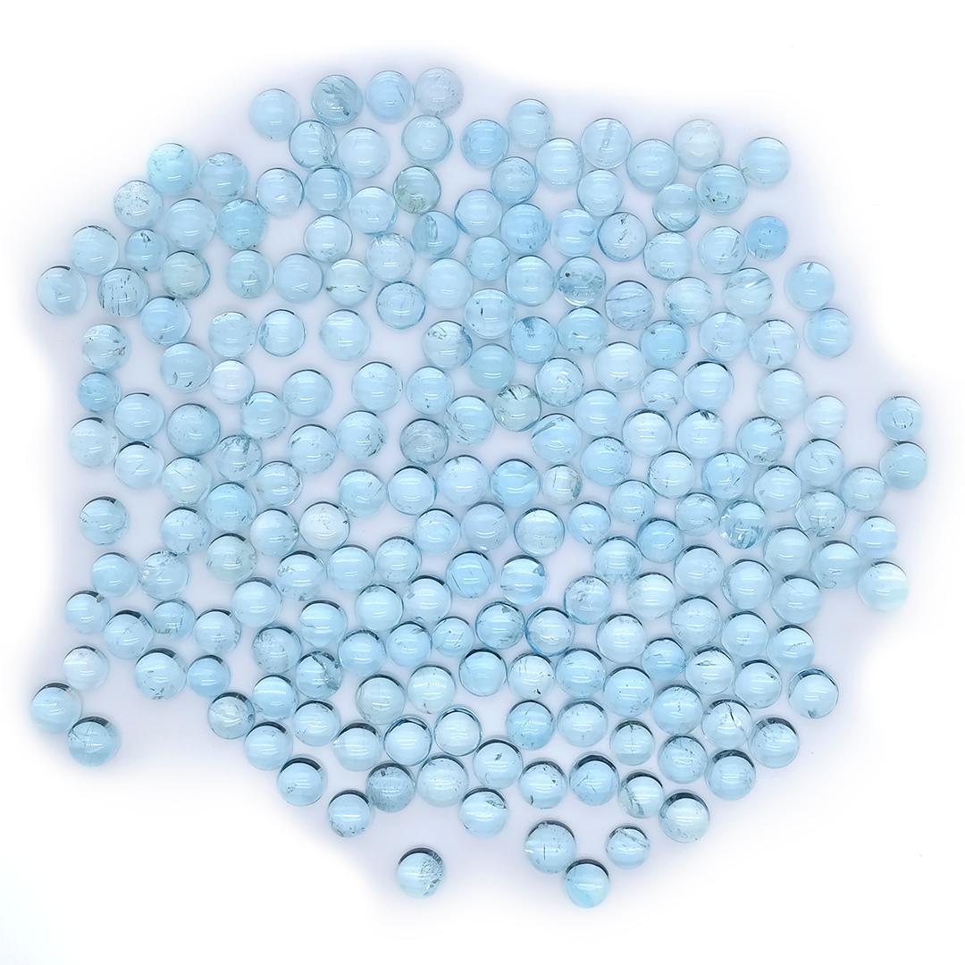 This stunning round aquamarine cabochons showcase an impressive 105.90 cts of exquisite beauty. 

These cabochons are known for their soft, luminous blue hues.

Each stone embodies a serene oceanic vibe, symbolizing calmness and clarity—qualities