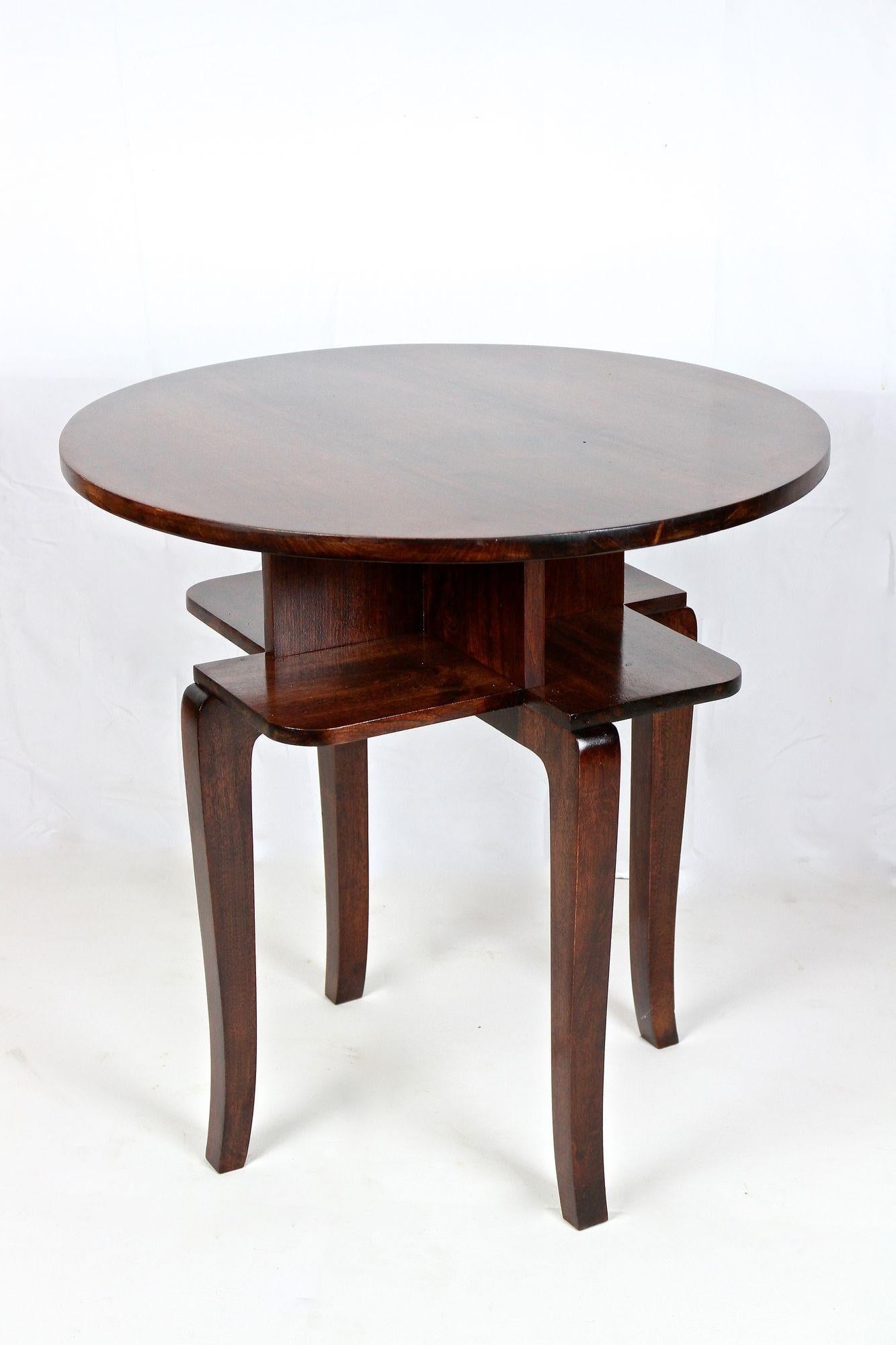 Extraordinary shaped round Art Deco design side table from Austria around 1920. Elaborately crafted out of fine bentwood (=beech wood) this beautiful round side table shows elegantly, slightly curved feet and a great looking surface which has been