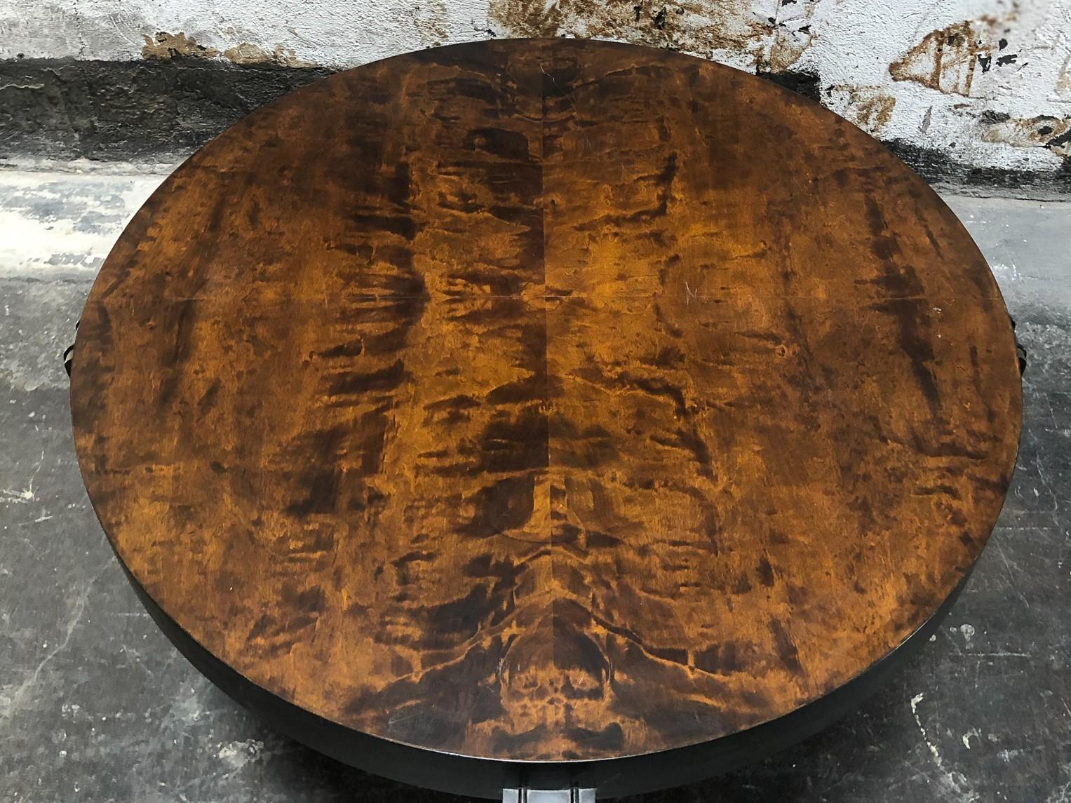 This is a truly special, one-of-a-kind piece. The stunning Swedish flame birch is rare and in excellent condition. Of the period Art Deco with dark contrast details, this table will add beauty and sophistication to any room.