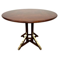 Round art deco dining table with brass 