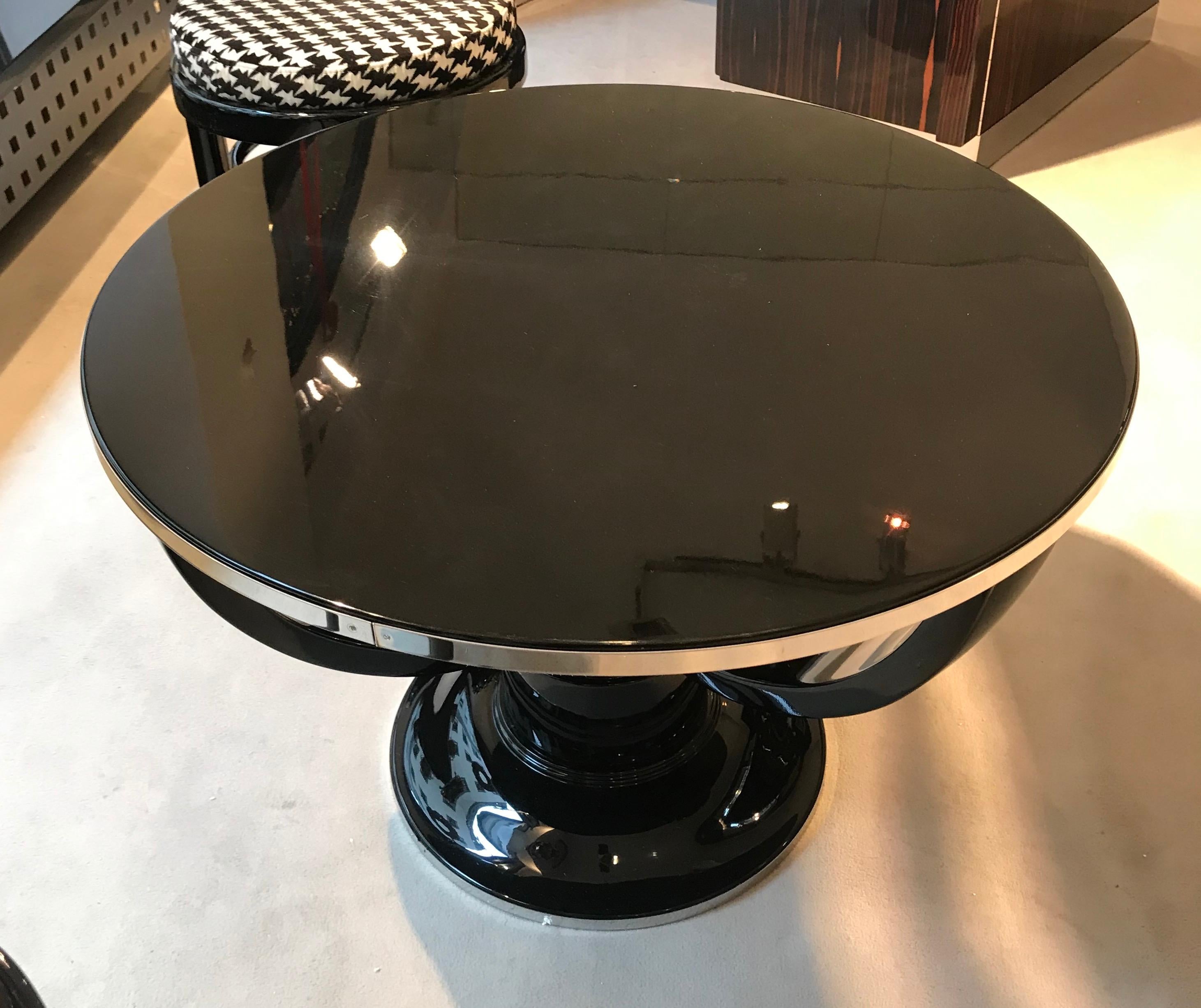 Very elegant, classic Art Deco Sofa / Side Table.

Blackened walnut wood, lacquered with Polyurethane and polished. Beautiful curved 4-edged legs.

Nickled and polished metal trim around the side of the plate. 

Round glass plate could be added for