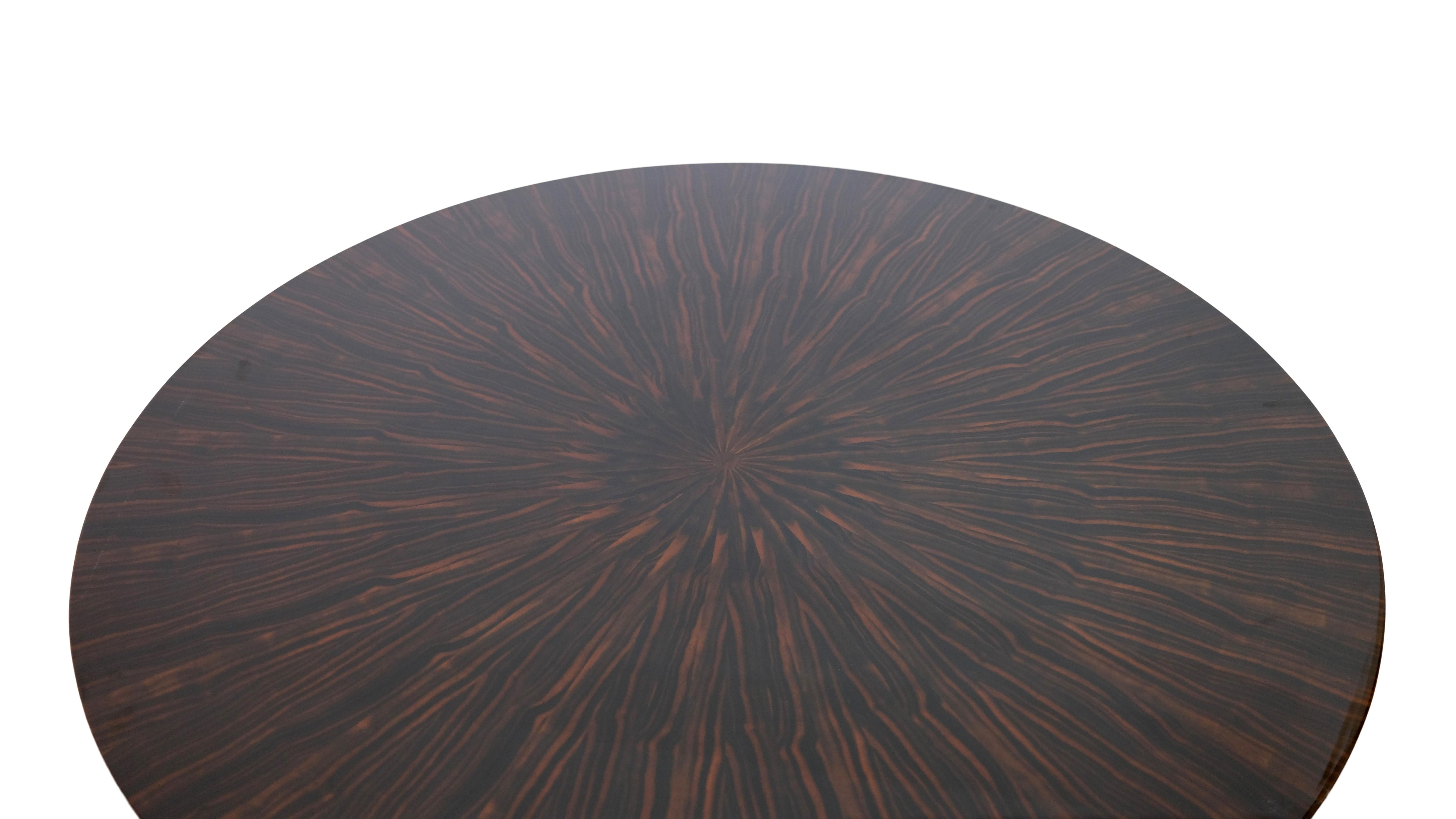Art Deco style round dining table
Macassar, high gloss lacquer
Black lacquer

Manufacture in the style of art deco, 2000s

Dimensions:
Diameter: 119 cm
Height: 75 cm.