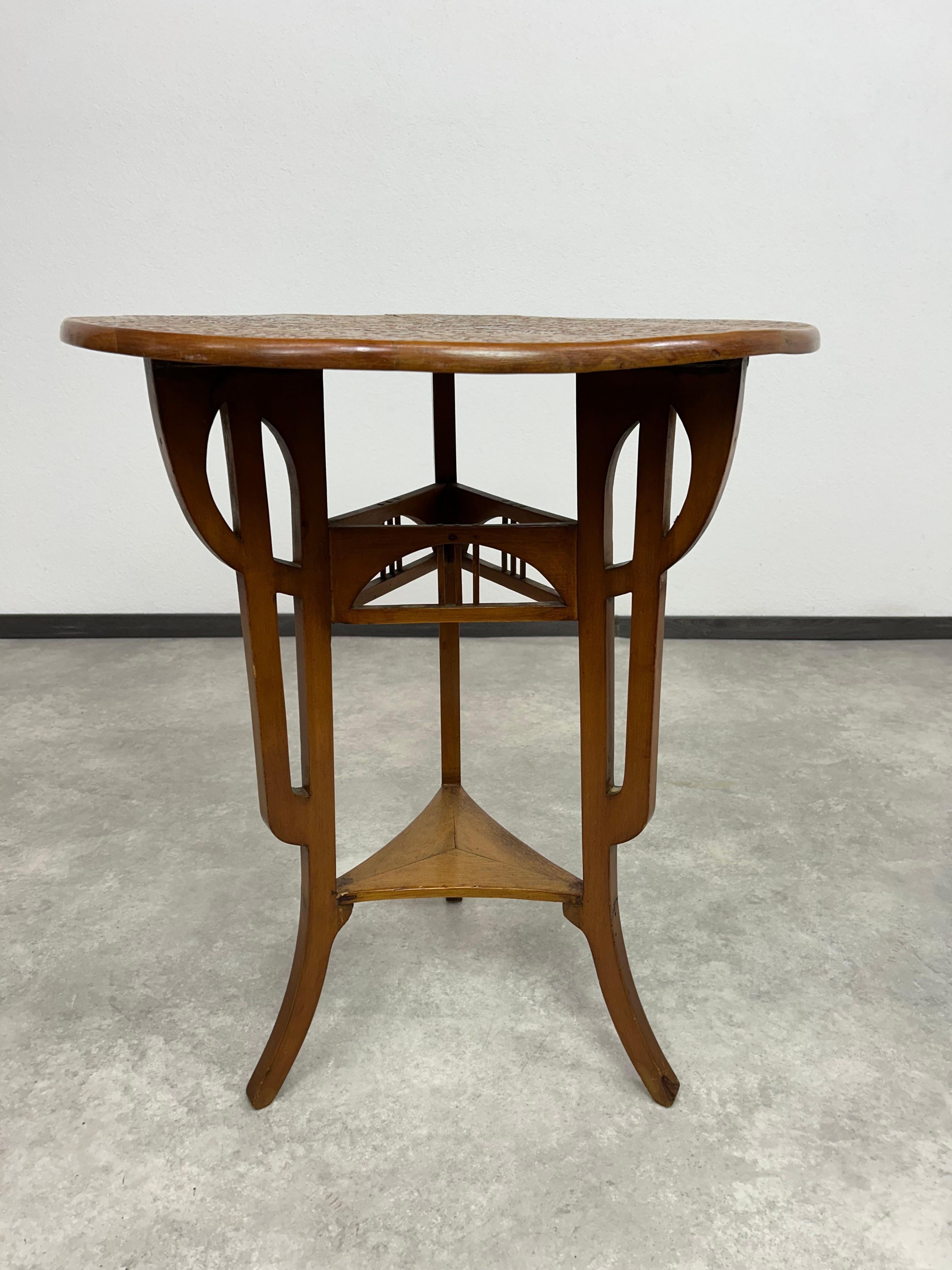 Art Nouveau Round art nouveau coffee table with carved top For Sale